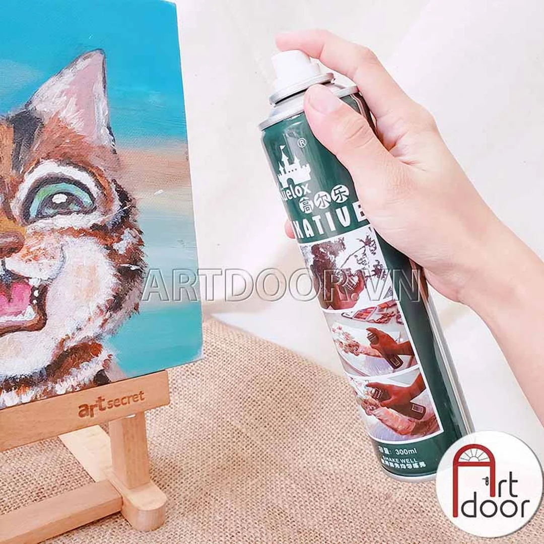 xịt bảo quản tranh kuelox cần lắc đều trước khi dùng